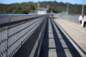 Welded Square Metal Fence Texture Shape with depth of field and people