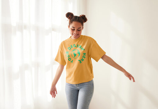 Mockup of customizable t shirt being modelled by woman, front view