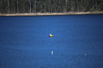 Solar Panel Buoy Floating on Lake