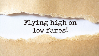 Flying high on low fares. Motivation concept text.