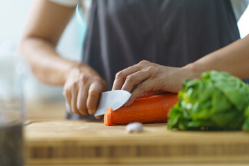 Prepare food  woman is preparing vegetable salad in the kitchen Healthy Food Healthy Cooking