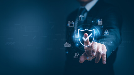 Businessman tapping showing data privacy protection or secure online transaction with shield icon On virtual screen, cyber security concept, internet secure technology