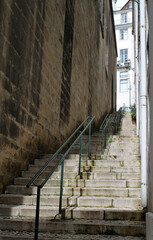 street with old facade full of stairs