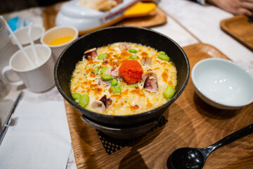 squid with fish roe egg and edamame in hot cheese risotto