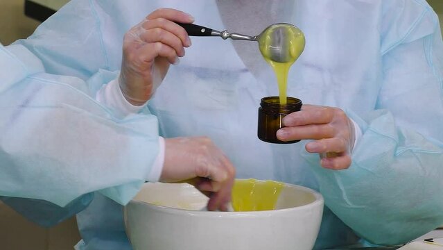 Pharmacist prepares the medicine in the laboratory according to an individual prescription