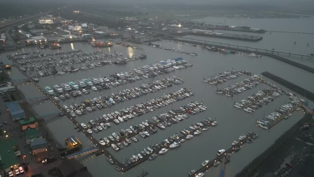 Drone Footage over Boat Harbour at night, Seward, Alaska , USA