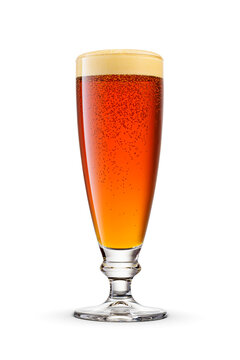 Flute glass of fresh dark brown beer with cap of foam isolated. Transparent PNG image.
