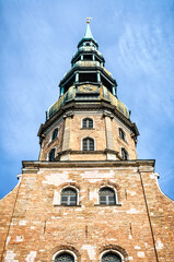 Close view of St Peters  medieval church in Riga, Latvia. Church built in 15th century church with 123m-high steeple.
