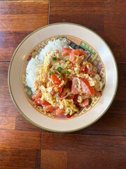 rice with tomatoes, egg scrambles