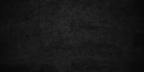 Dark black Close up retro plain dark black cement and concrete wall background texture. Background image of texture plaster on the wall in dark black tones in grunge style backdrop.