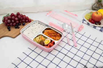 Colored plastic bento cutlery box placed on the table