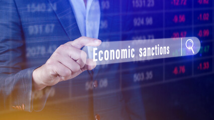 Economic sanctions, written in search bar with the financial data visible in the background....
