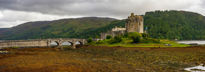 Eilean Donan Castle in Scotland in the evening. Tidal island between Loch Duich, Loch Long and Loch Alsh. Western Highlands, Scotland, Great Britain, United Kingdom.
