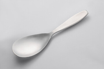 Stainless steel tableware and kitchen utensils placed on the desktop