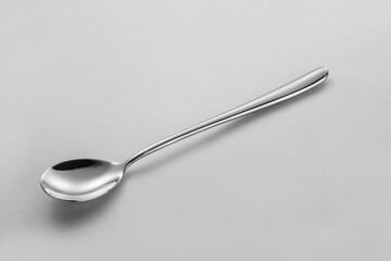 Stainless steel tableware and kitchen utensils placed on the desktop