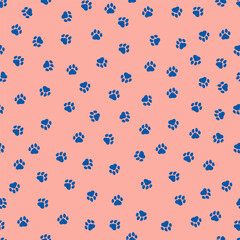 Pink seamless pattern with small blue paws