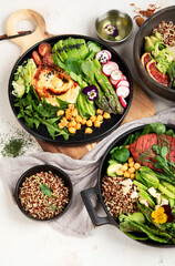 Healthy vegetarian and vegan  salads and Buddha Bowls with vitamins, antioxidants, protein on light  background.