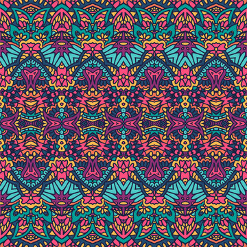 Vector seamless pattern ethnic tribal floral psychedelic colorful fabric print. Ethnic brihgt mandala ornaments