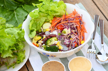 Thai food vegetable salads on salads bowl with salad dressing fresh vegetable fruit nuts and grains for healthy food mixed vegetable salad vegetarian green and colorful food for breakfast