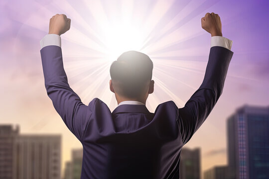 Successful businessman raising hand and expressing positivity while standing against skyscrapers background