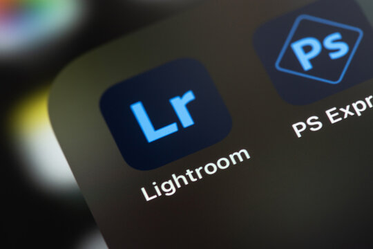 Adobe Lightroom mobile icon app on the screen smartphone iPhone closeup. Adobe Systems Incorporated is an American multinational computer software company. Batumi, Georgia - April 12, 2023