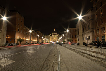 Fototapeta na wymiar Rome, Saint Peter Square at night from Via della Conciliazione