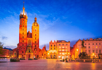 Fototapeta na wymiar Krakow, Poland. Gothic historic charm shine at Cracovia's night scene.