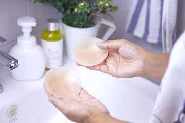 Naklejka premium Washing silicone sticker pad to cover nipples in the bathroom