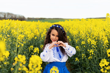 Pray for Ukraine. Stop war. Ukraines Independence  Day. Constitution day. Ukrainian girl  in embroidered shirt vyshyvanka. Ukrainians are against war. Kolza