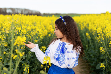 Pray for Ukraine. Stop war. Ukraines Independence  Day. Constitution day. Ukrainian girl  in embroidered shirt vyshyvanka. Ukrainians are against war. Kolza