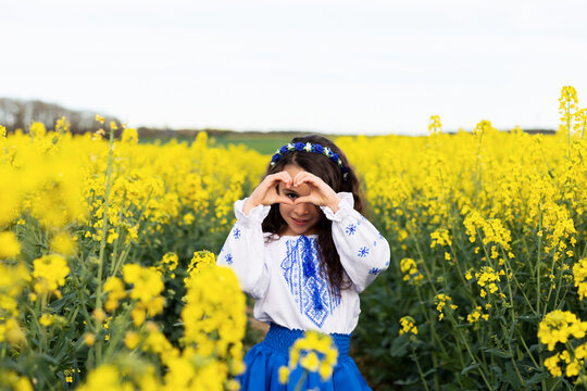 Pray for Ukraine. Stop war. Ukraines Independence  Day. Constitution day. Ukrainian girl  in embroidered shirt vyshyvanka. Ukrainians are against war. Kolza