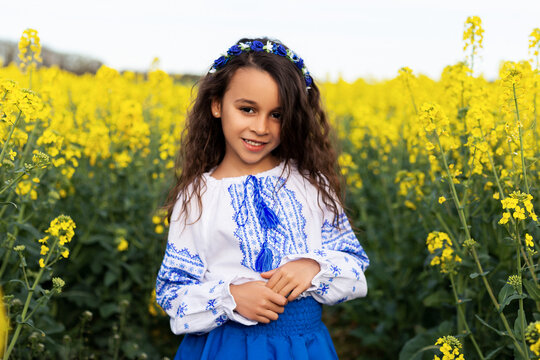 Pray for Ukraine. Stop war. Ukraines Independence  Day. Constitution day. Ukrainian girl  in embroidered shirt vyshyvanka. Ukrainians are against war. Kolza