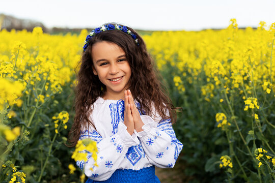Pray for Ukraine. Stop war. Ukraines Independence  Day. Constitution day. Ukrainian girl  in embroidered shirt vyshyvanka. Ukrainians are against war. Kolza