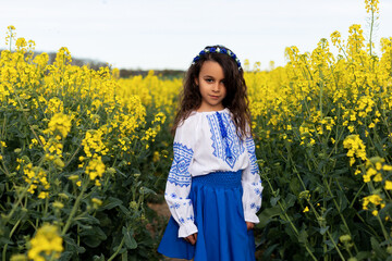 Pray for Ukraine. Stop war. Ukraines Independence  Day. Constitution day. Ukrainian girl  in embroidered shirt vyshyvanka. Ukrainians are against war. Kolza