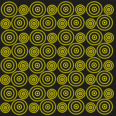 Seamless vector geometric pattern in the form of golden yellow circles on a black background