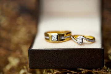 Close-up view of gold diamond wedding rings