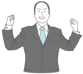 握り拳のポーズをするスーツを着た男性
