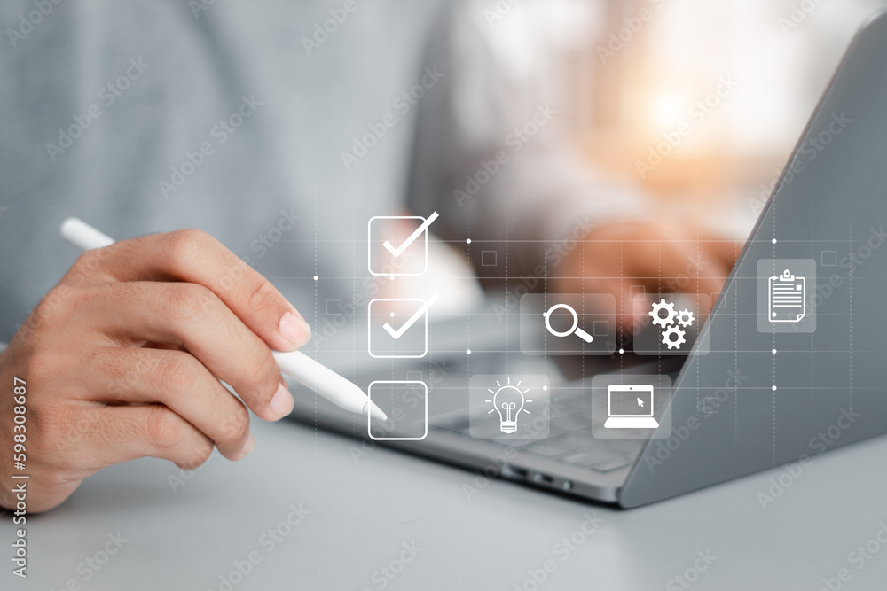 Poster checklist concept. businessman using laptop. checking mark on checkboxes.