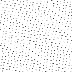 Small particles of different shapes form the texture.