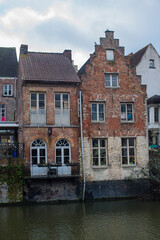 Fototapeta na wymiar old stone houses on the canal in Belgium 