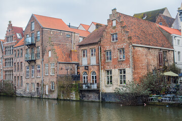 Fototapeta na wymiar old stone houses on the canal in Belgium 