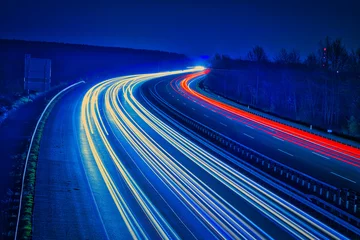 Foto op Plexiglas Snelweg bij nacht Langzeitbelichtung - Autobahn - Strasse - Traffic - Travel - Background - Line - Ecology - Highway - Night Traffic - Light Trails - High quality photo