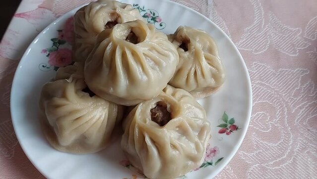Traditional Buryad Cuisine Food with Chopped Meat and Dough. Preparing Making Dumplings Close-up	

