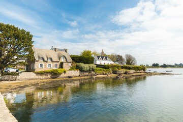 French Brittany typical view. Saint Cado island in Bretagne, France. Sunny day typical rural Breton house.