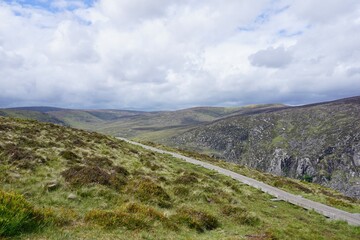 Hking trail in the cloudy landscape of Ireland