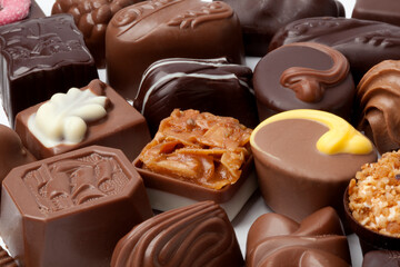 Variation of chocolate bonbons close up full frame as background