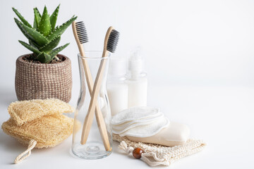 Zero waste, sustainable bathroom beauty products. Bamboo toothbrush, oganic soap bar, loofah...
