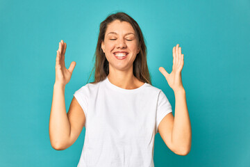 Fototapeta premium A young caucasian woman isolated joyful laughing a lot. Happiness concept.