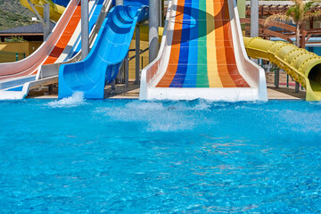 Colorful kids waterpark and a swimming pool