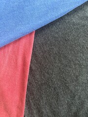 Blue, red, and dark gray fabric